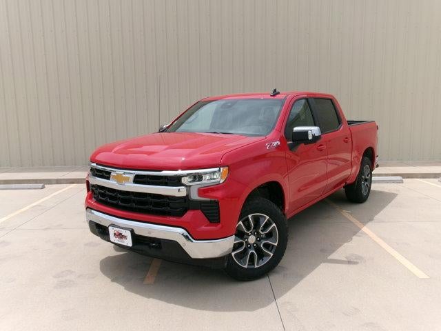 2026 Chevrolet Silverado 1500 LT in Red Hot — front three-quarter view